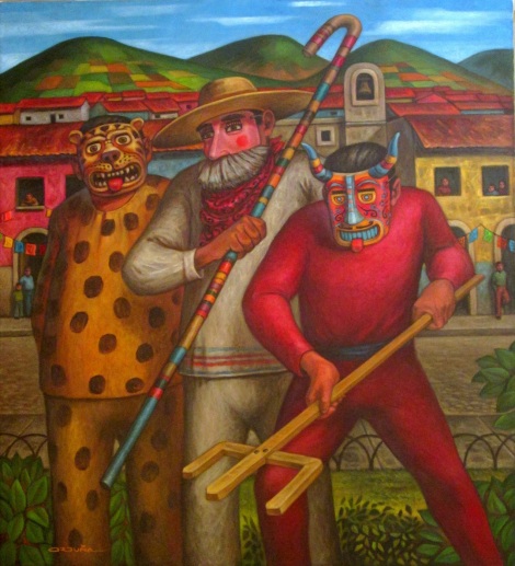 Tres personajes de algún pueblo de Mexico, posan con sus mascaras y vistosos atuendos en  tiempo de carnaval.